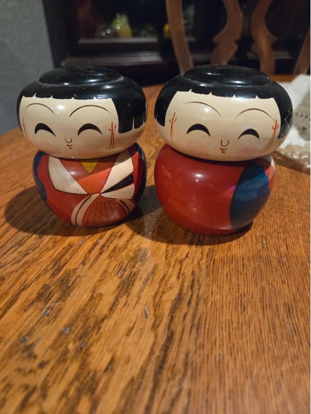 Japanese lacquered wood kokeshi doll salt and pepper shakers.
